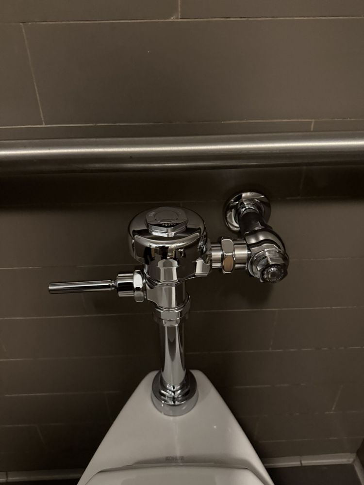 Commercial restroom flush valve installation and repair