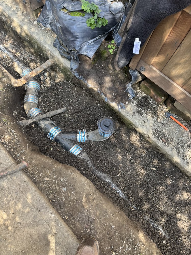 Underground main line leak repair with new coupling fittings